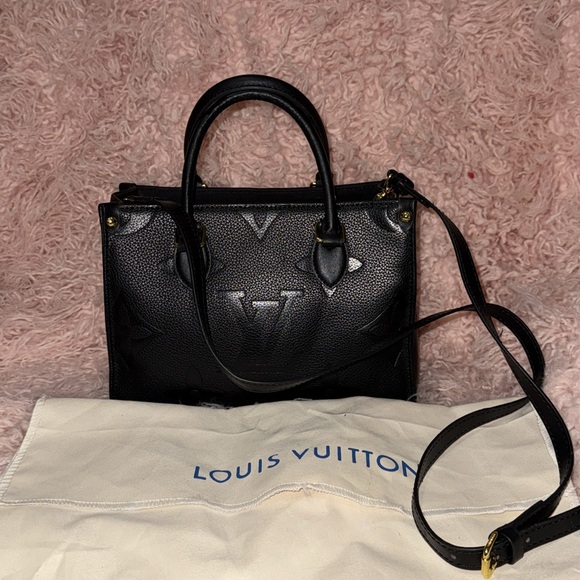 Louis Vuitton Elegant Black Tote with Gold Details - Picture 1 of 6